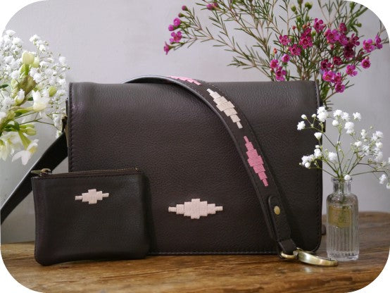 leather bag and purse with flowers